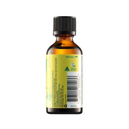Bottle of essential oil with a yellow label on a white background