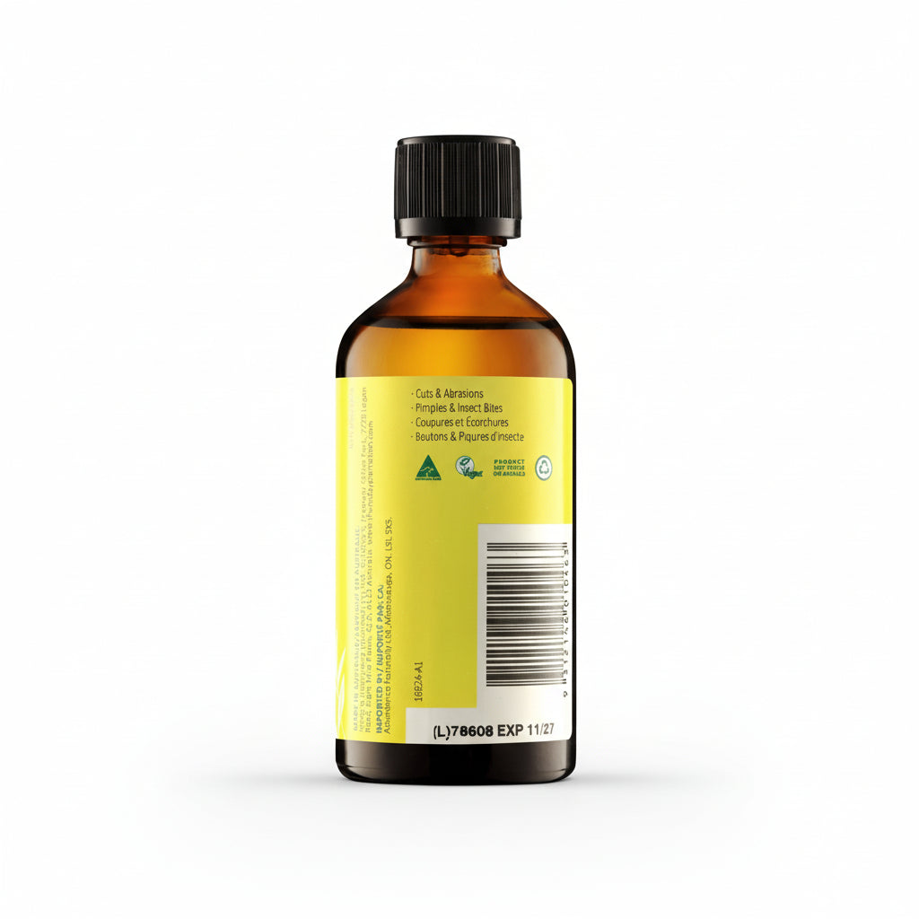 Bottle of liquid with a yellow label on a white background