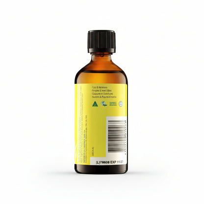 Bottle of liquid with a yellow label on a white background